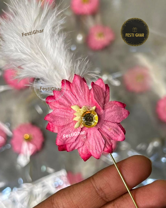 Brooch with pink flower and feather